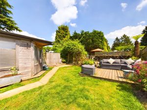 REAR GARDEN WITH DECKED SEATING AREA- click for photo gallery